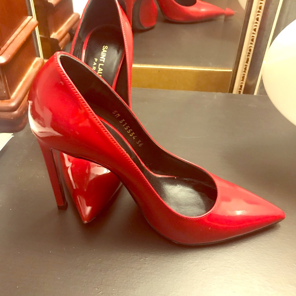 Authentic red Yves Saint Lauren size 36 stilettos.